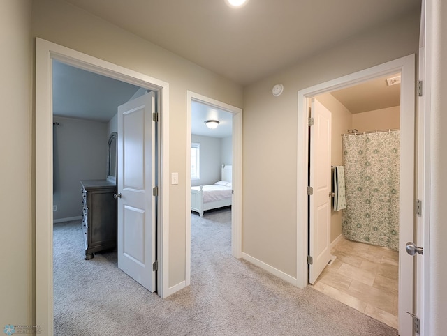 2715 11th St W, West Fargo, ND 58078 - corridor featuring carpet floors and baseboards