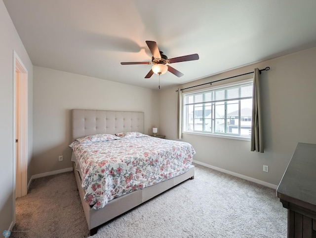 2715 11th St W, West Fargo, ND 58078 - carpeted bedroom featuring baseboards and a ceiling fan