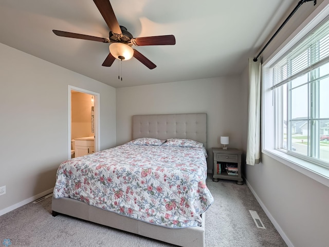 2715 11th St W, West Fargo, ND 58078 - carpeted bedroom featuring ceiling fan and connected bathroom