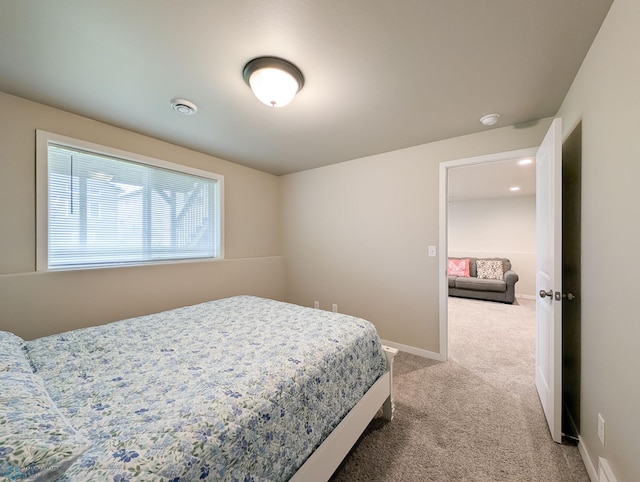 2715 11th St W, West Fargo, ND 58078 - bedroom with carpet flooring and baseboards