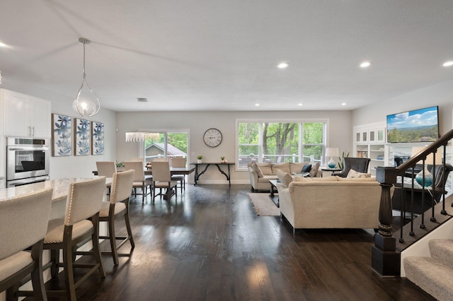 12601 Ridgemount Ave W, Minnetonka, MN 55305 - living room with dark wood-style floors, stairway, recessed lighting, and baseboards