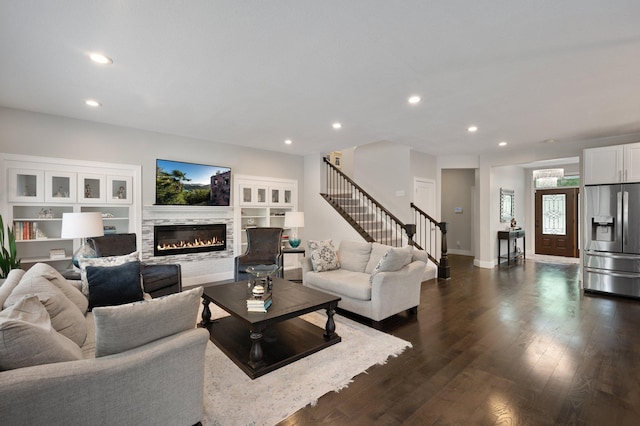 12601 Ridgemount Ave W, Minnetonka, MN 55305 - living area with stairway, recessed lighting, a stone fireplace, dark wood-type flooring, and baseboards