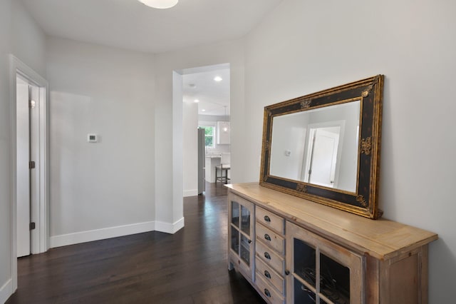 12601 Ridgemount Ave W, Minnetonka, MN 55305 - hallway featuring dark wood finished floors, baseboards, and recessed lighting