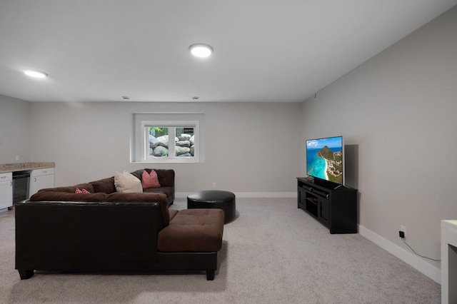 12601 Ridgemount Ave W, Minnetonka, MN 55305 - living room with light carpet, baseboards, and a bar