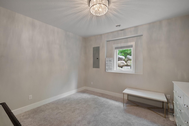 12601 Ridgemount Ave W, Minnetonka, MN 55305 - empty room with electric panel, a chandelier, carpet, and baseboards