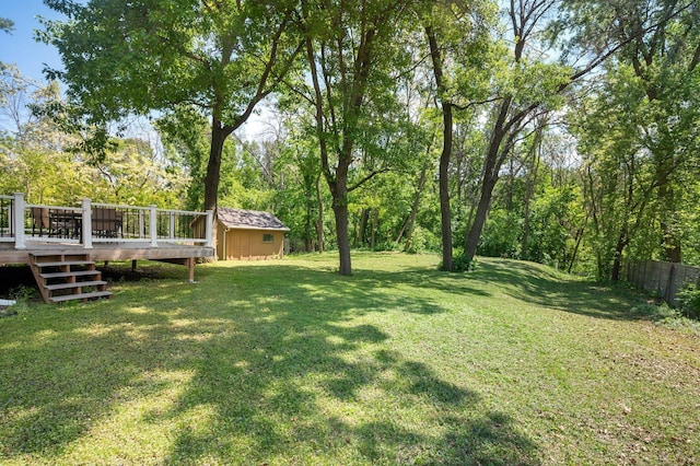 12601 Ridgemount Ave W, Minnetonka, MN 55305 - view of yard featuring a wooden deck and an outbuilding