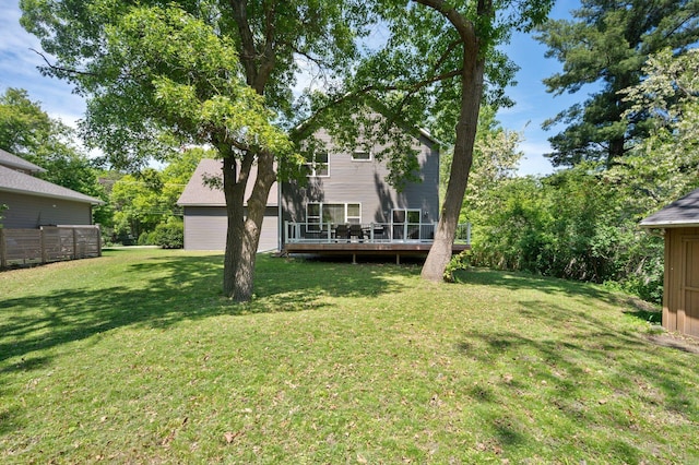 12601 Ridgemount Ave W, Minnetonka, MN 55305 - view of grassy yard with a wooden deck