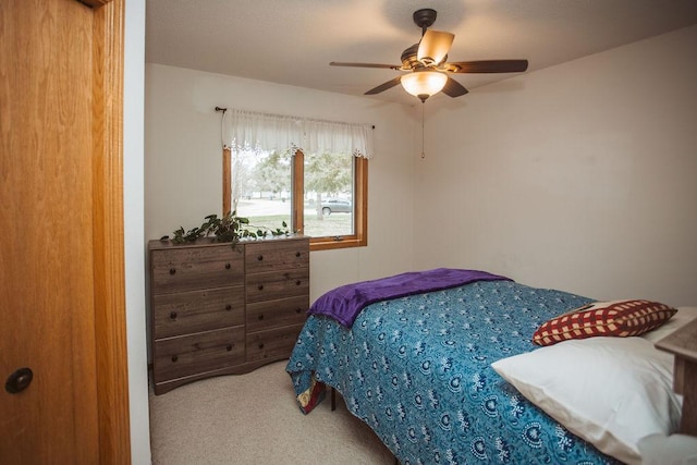 2501 Woodridge Ln, Brainerd, MN 56401 - carpeted bedroom with a ceiling fan