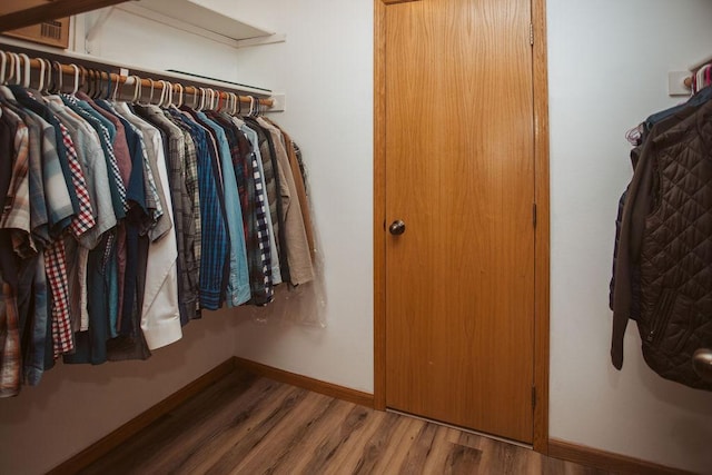 2501 Woodridge Ln, Brainerd, MN 56401 - spacious closet with wood finished floors