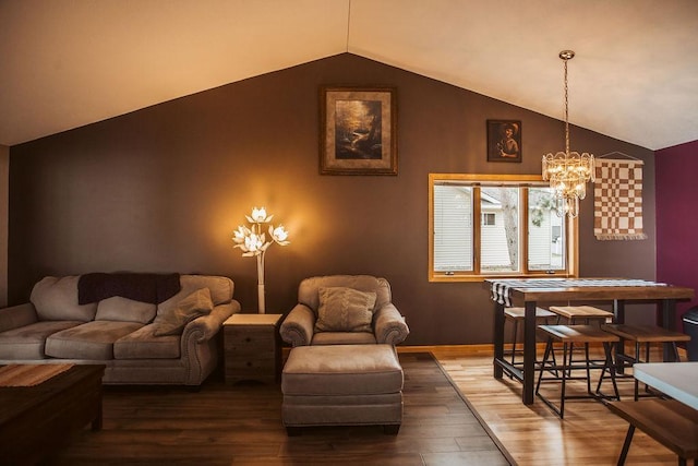 2501 Woodridge Ln, Brainerd, MN 56401 - living room with lofted ceiling, wood finished floors, and a chandelier