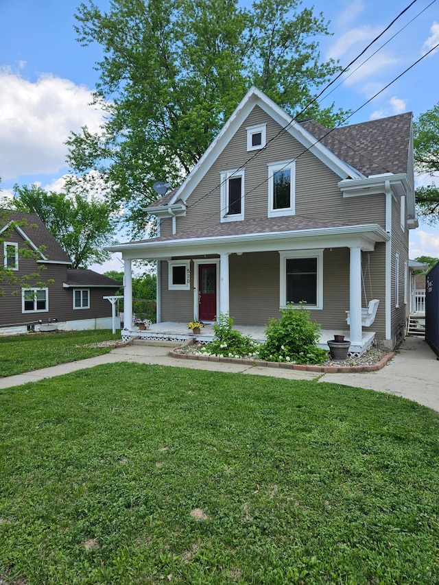 530 Willis St, Dassel, MN 55325 - view of front of home with a porch, a front yard, and a shingled roof