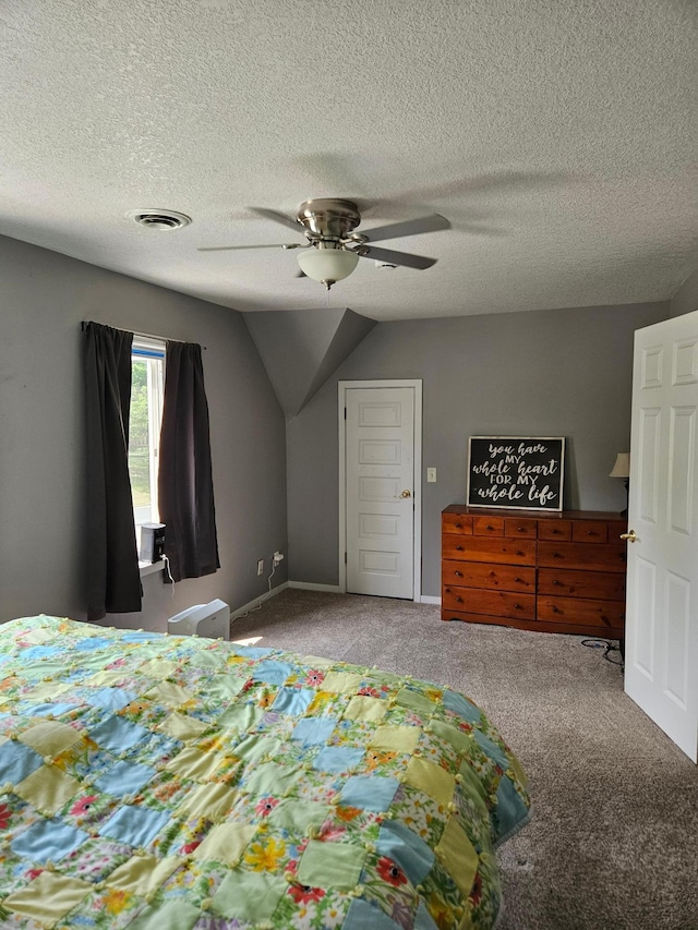 530 Willis St, Dassel, MN 55325 - bedroom featuring carpet flooring, vaulted ceiling, a textured ceiling, and a ceiling fan