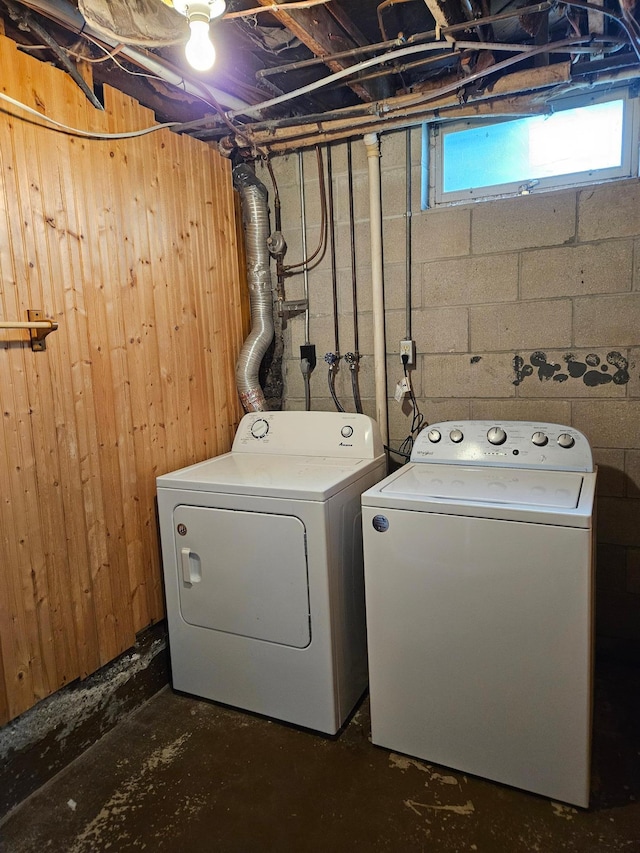 530 Willis St, Dassel, MN 55325 - washroom featuring washing machine and clothes dryer and wooden walls