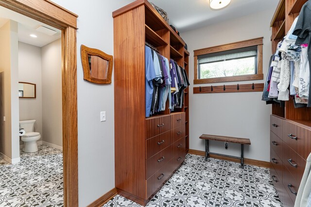 918 Hidden Meadow Ln, Lake City, MN 55041 - spacious closet featuring light tile patterned floors