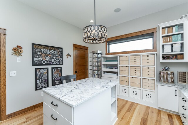 918 Hidden Meadow Ln, Lake City, MN 55041 - walk in closet featuring light wood-type flooring and a chandelier