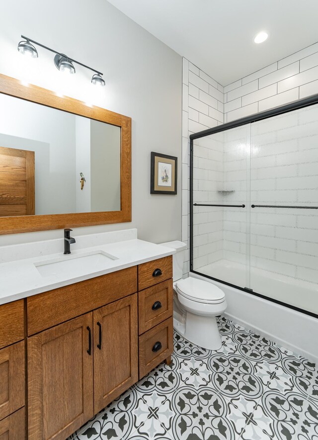 918 Hidden Meadow Ln, Lake City, MN 55041 - bathroom with vanity, toilet, shower / bath combination with glass door, and recessed lighting