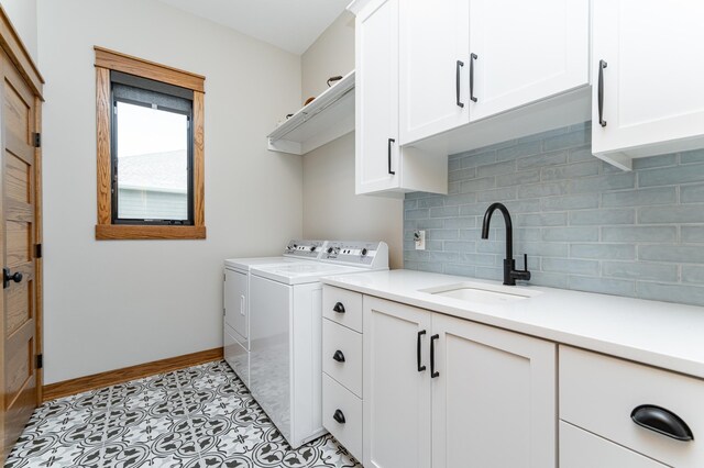 918 Hidden Meadow Ln, Lake City, MN 55041 - laundry room with cabinet space, independent washer and dryer, and baseboards