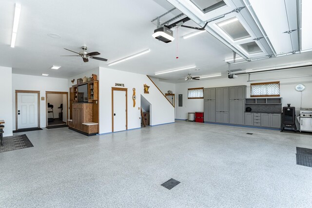 918 Hidden Meadow Ln, Lake City, MN 55041 - garage featuring ceiling fan and a garage door opener