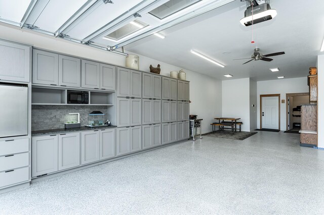 918 Hidden Meadow Ln, Lake City, MN 55041 - garage with a garage door opener and ceiling fan