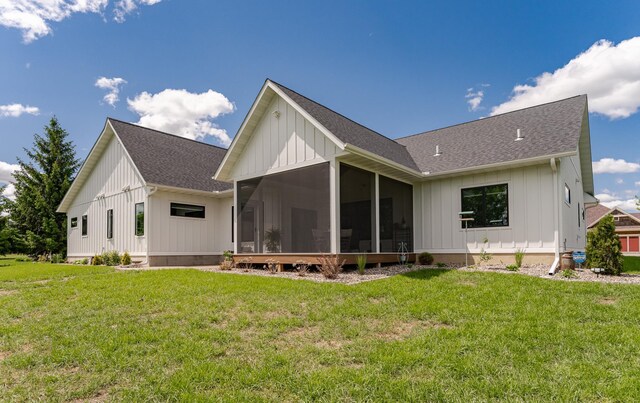 918 Hidden Meadow Ln, Lake City, MN 55041 - rear view of house with a sunroom, board and batten siding, and a shingled roof