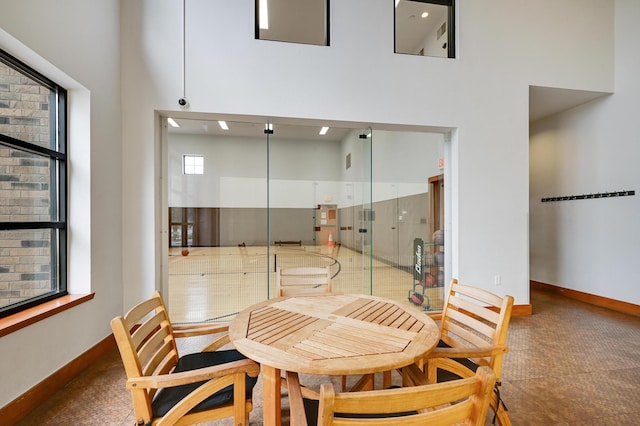 13580 Technology Dr Unit 3222, Eden Prairie, MN 55344 - dining room with a towering ceiling and baseboards