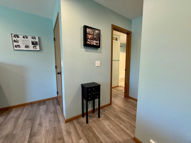 2014 Nelson Dr, Thief River Falls, MN 56701 - hallway with wood finished floors and baseboards