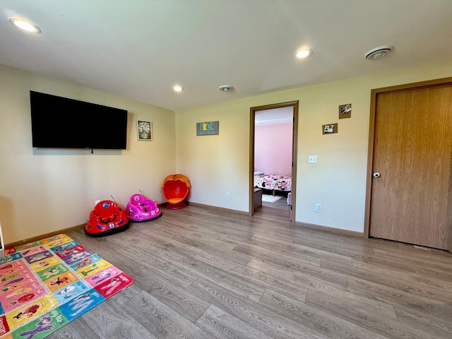 2014 Nelson Dr, Thief River Falls, MN 56701 - rec room with wood finished floors, baseboards, and recessed lighting