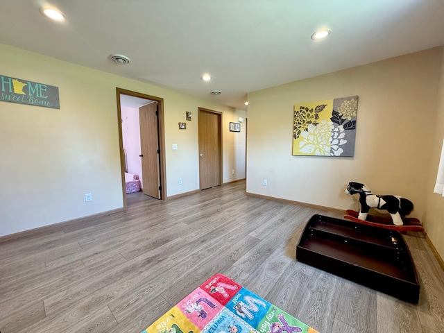 2014 Nelson Dr, Thief River Falls, MN 56701 - recreation room featuring wood finished floors, recessed lighting, and baseboards