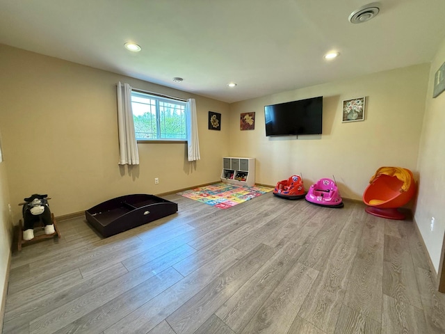 2014 Nelson Dr, Thief River Falls, MN 56701 - game room with wood finished floors, baseboards, and recessed lighting