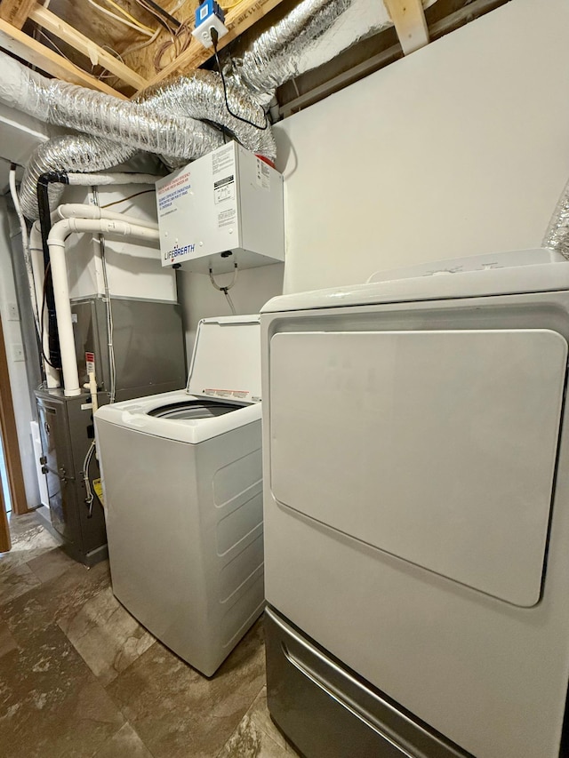 2014 Nelson Dr, Thief River Falls, MN 56701 - utilities with washer and dryer