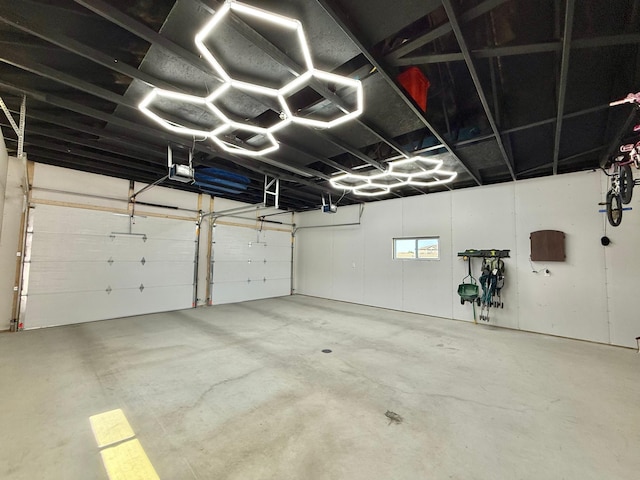 2014 Nelson Dr, Thief River Falls, MN 56701 - garage featuring a garage door opener