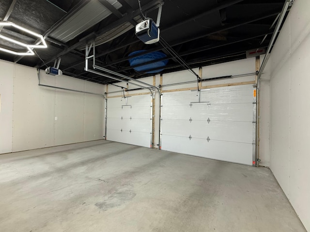 2014 Nelson Dr, Thief River Falls, MN 56701 - garage featuring a garage door opener