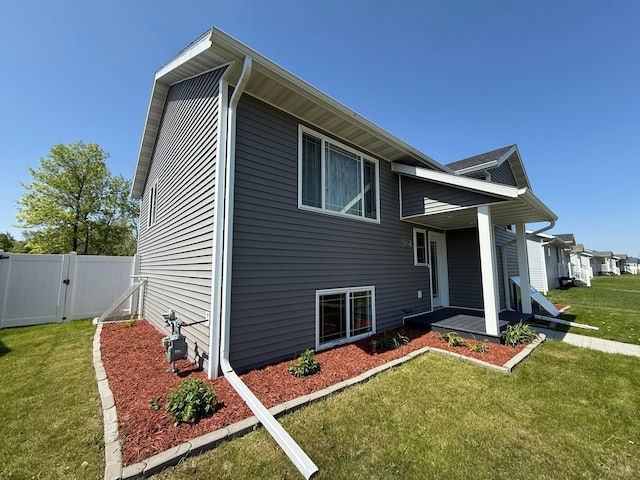 2014 Nelson Dr, Thief River Falls, MN 56701 - view of front of home with a gate