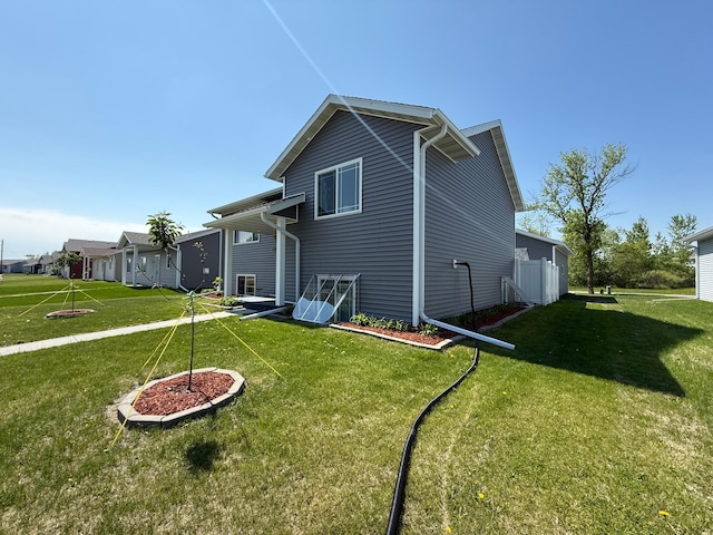 2014 Nelson Dr, Thief River Falls, MN 56701 - back of property with a yard