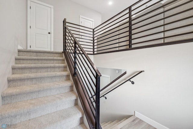 5837 41st St S, Fargo, ND 58104 - staircase featuring baseboards