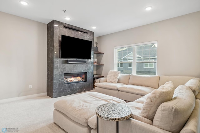 5837 41st St S, Fargo, ND 58104 - living room featuring a premium fireplace, carpet floors, recessed lighting, and baseboards