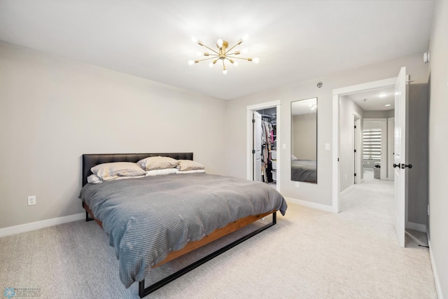 5837 41st St S, Fargo, ND 58104 - bedroom with a chandelier, light colored carpet, and baseboards
