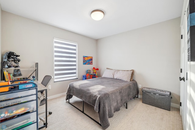 5837 41st St S, Fargo, ND 58104 - carpeted bedroom featuring baseboards