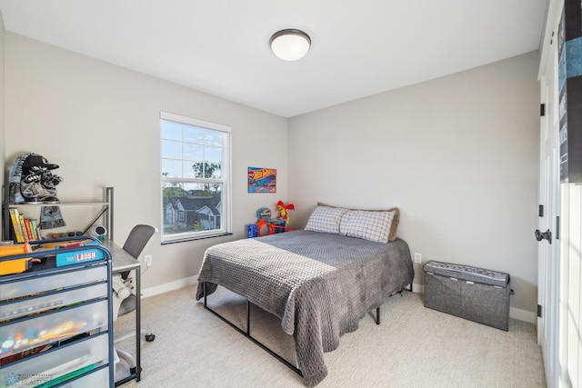 5837 41st St S, Fargo, ND 58104 - carpeted bedroom featuring baseboards