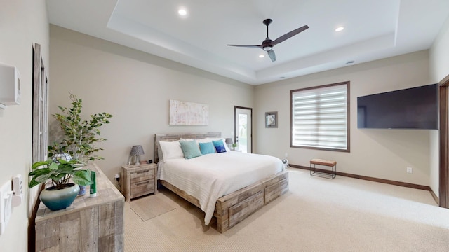 807 Whitetail Ln, Detroit Lakes, MN 56501 - bedroom with a raised ceiling, light carpet, recessed lighting, baseboards, and ceiling fan