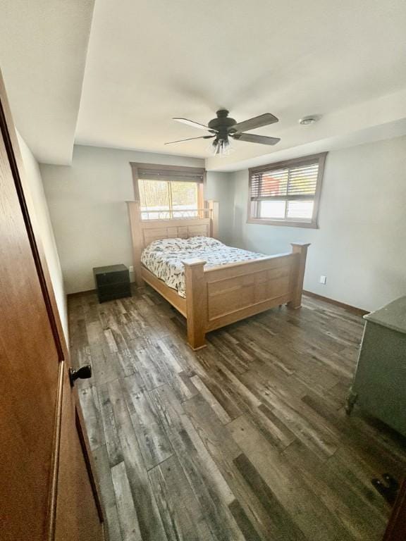 46824 Foss Rd, Osage, MN 56570 - bedroom with wood finished floors, ceiling fan, and baseboards