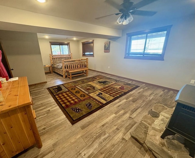 46824 Foss Rd, Osage, MN 56570 - bedroom with wood finished floors, baseboards, and recessed lighting