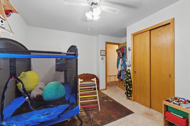1013 15 1/2 St N, Moorhead, MN 56560 - playroom with ceiling fan and carpet