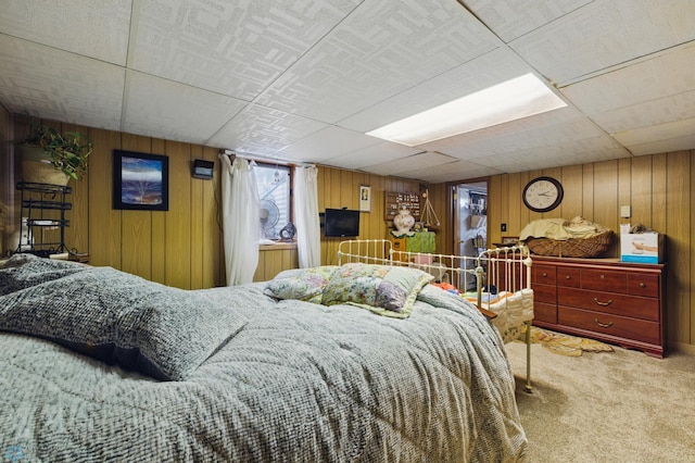 1013 15 1/2 St N, Moorhead, MN 56560 - bedroom with carpet and wooden walls