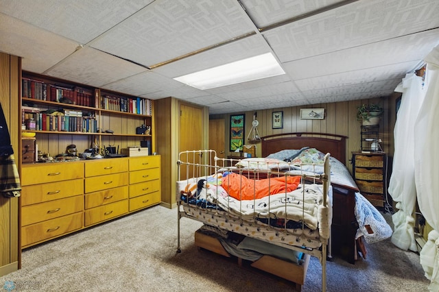 1013 15 1/2 St N, Moorhead, MN 56560 - bedroom with carpet, wood walls, and a paneled ceiling