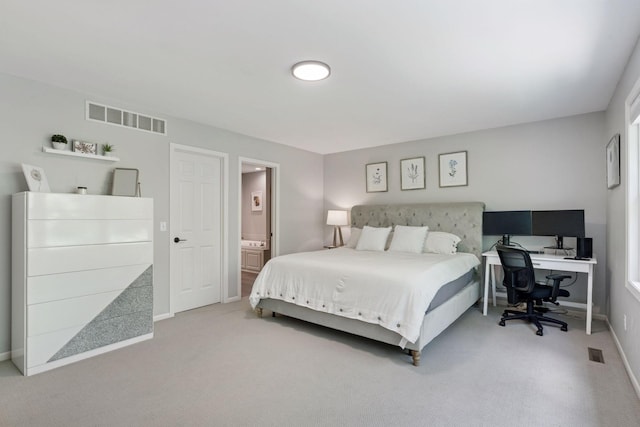 6609 Red Birch Ct, Lino Lakes, MN 55014 - bedroom with carpet flooring, baseboards, a desk, and ensuite bathroom