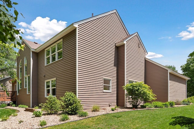 6609 Red Birch Ct, Lino Lakes, MN 55014 - view of property exterior with a yard and a wooden deck