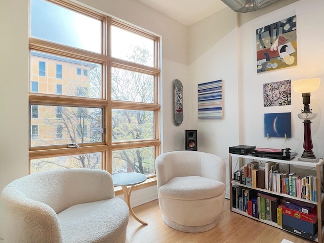 2840 Bryant Ave S Unit E303, Minneapolis, MN 55408 - living area with wood finished floors and baseboards