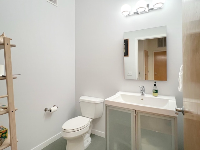 2840 Bryant Ave S Unit E303, Minneapolis, MN 55408 - bathroom featuring toilet, vanity, and baseboards