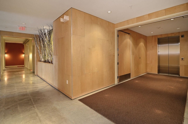 2840 Bryant Ave S Unit E303, Minneapolis, MN 55408 - hall with elevator, concrete flooring, and recessed lighting